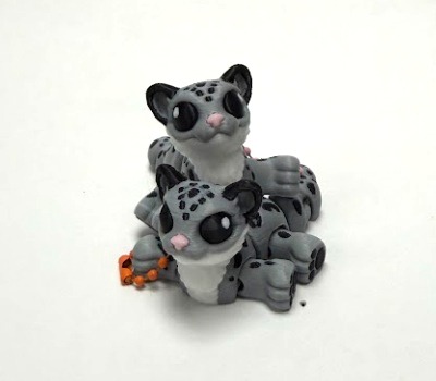 Snow Leopard Flexi Keychain