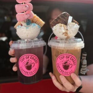 Sly flexi raccoon sliding down the outside of a cool bucket drink.